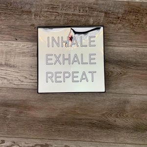 Light up sign, blue has a mirror in the middle